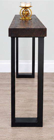 Side profile of asymmetric black steel console table leg with rectangular frame and wooden tabletop