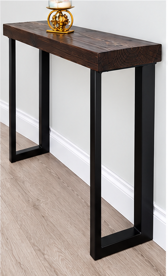 Asymmetric black metal console table legs fitted to a dark wooden tabletop in a modern hallway