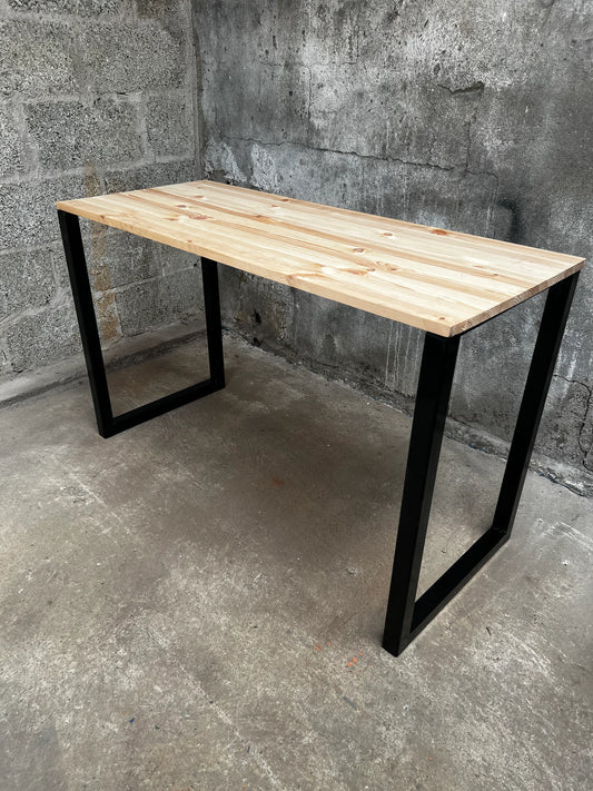Heavy duty black steel table legs fitted to a wooden dining table
