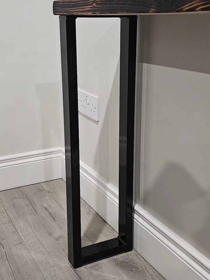 Handmade black powder coated console table leg side view